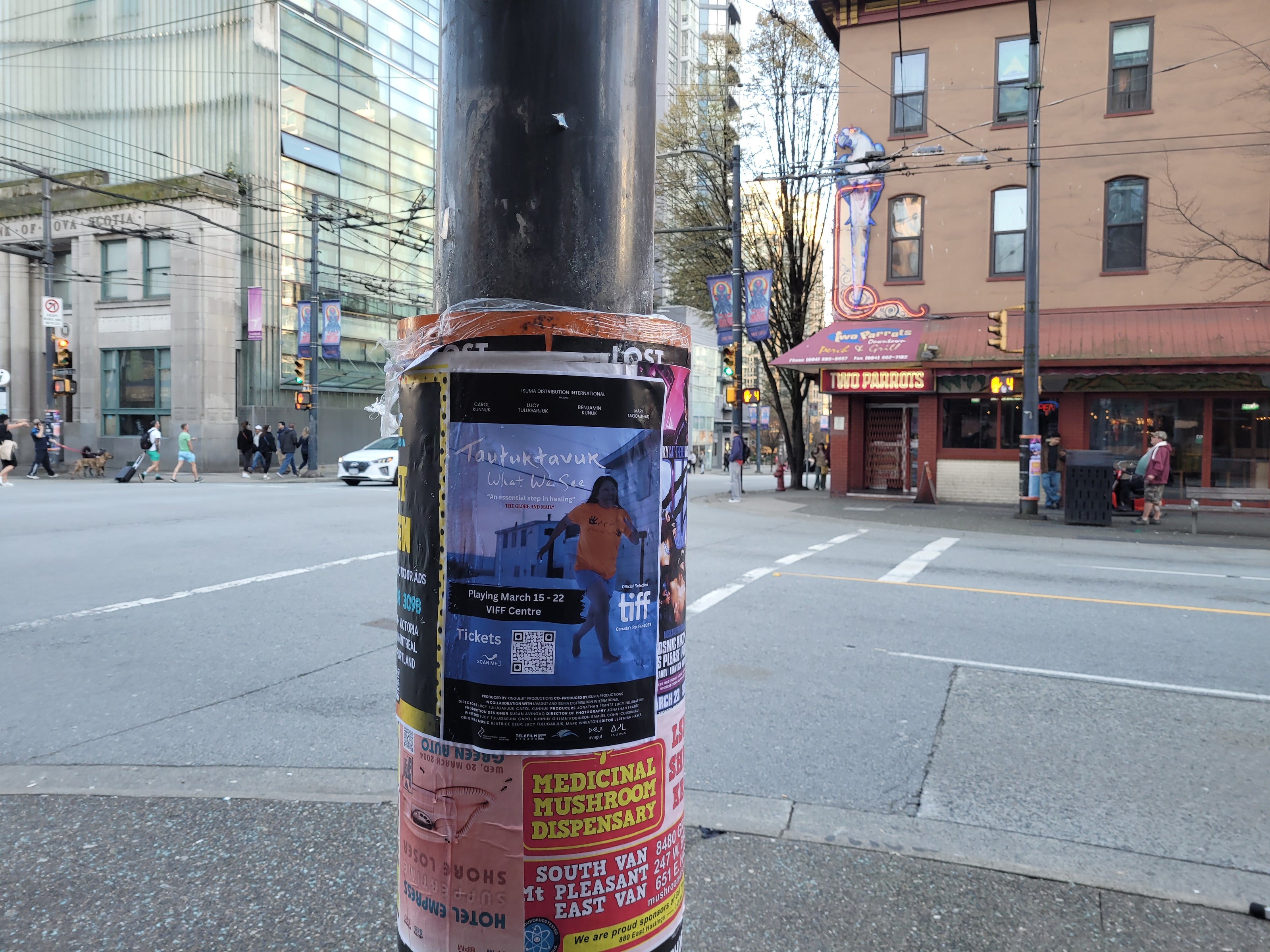 Posters on a telephone pole in downtown Vancouver installed by Skyline City Media