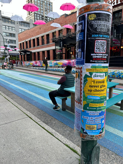 Posters distributed on a city cylinder in Yaletown by Skyline City Media