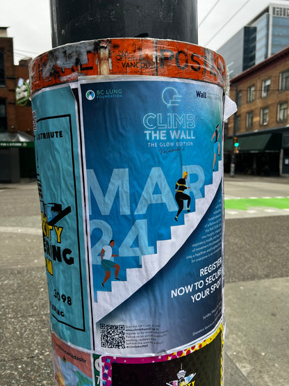 Posters distributed on a postering city cylinder in Downtown Vancouver by Skyline City Media