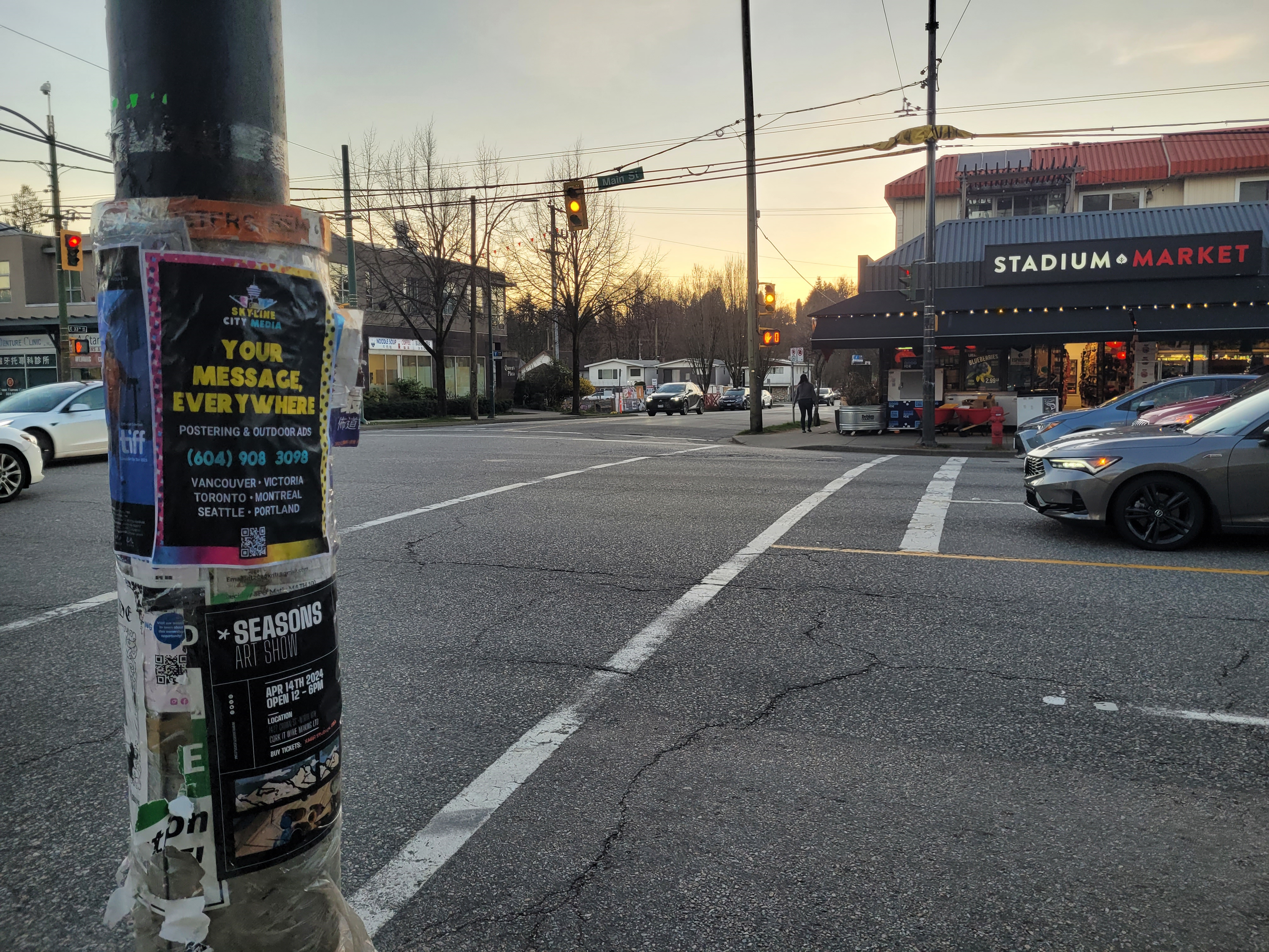 Vancouver postering - posters installed on a city cylinder on Main Street by Skyline City Media